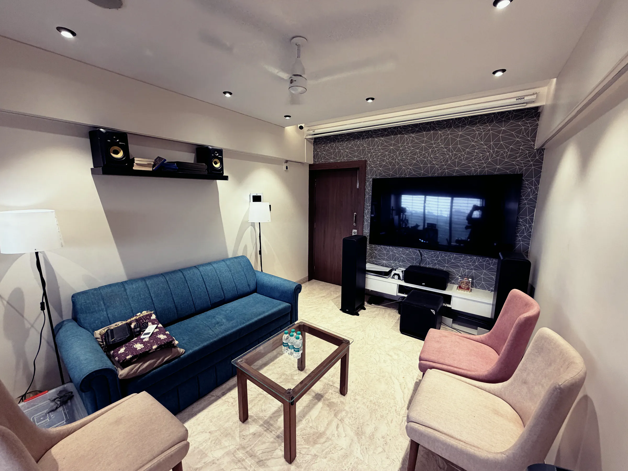 Studio lounge with a sofa and armchairs